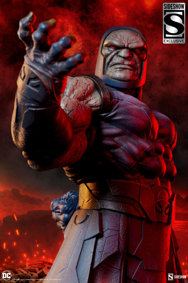 Darkseid DC Comics Maquette from Sideshow Collectibles. A highly detailed figure of the comic book character Darkseid with a raised hand, set against a fiery backdrop.