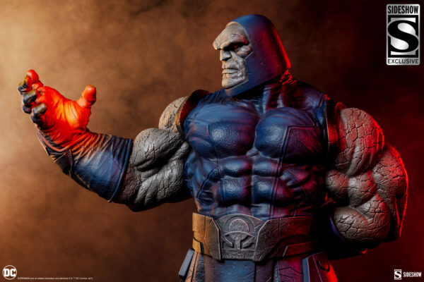 Darkseid DC Comics Maquette from Sideshow Collectibles. A detailed statue of Darkseid with a glowing hand, from the DC Universe, against a smoky backdrop.