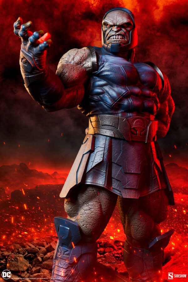 Darkseid DC Comics Maquette from Sideshow Collectibles. An imposing figure of Darkseid, with one hand clenched, stands in front of a fiery backdrop, exuding power and dread.