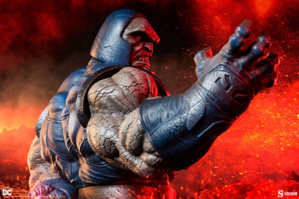 Darkseid DC Comics Maquette from Sideshow Collectibles. A highly detailed close-up image of the supervillain Darkseid from DC Comics with a fiery background, showcasing his powerful and menacing presence.