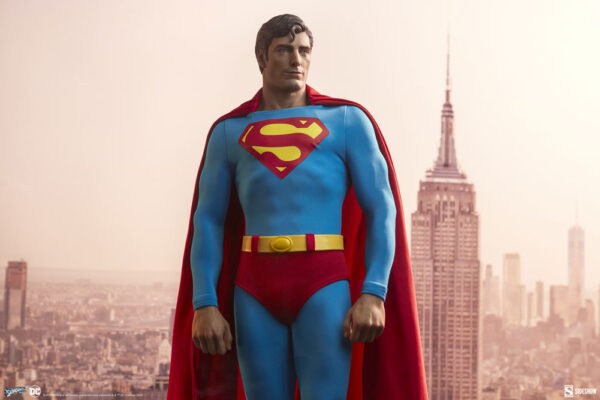 Superman: The Movie Premium Format™ Figure from Sideshow Collectibles and DC Comics. A figure of Superman with traditional costume standing confidently against a city skyline background.