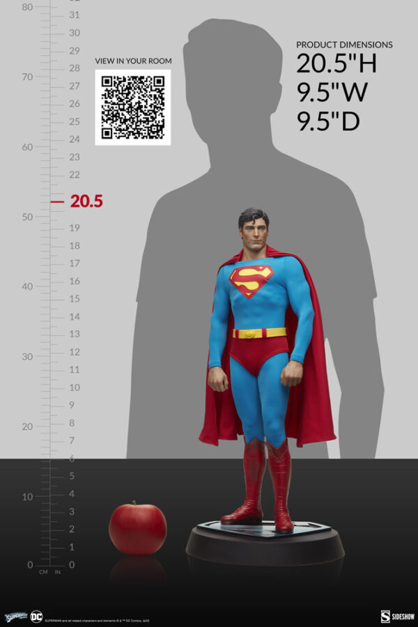 Superman: The Movie Premium Format™ Figure from Sideshow Collectibles and DC Comics. An image showcasing a Superman statue with its dimensions of 20.5 inches in height displayed next to a height chart, with a QR code for viewing the statue in your room and an apple for scale.