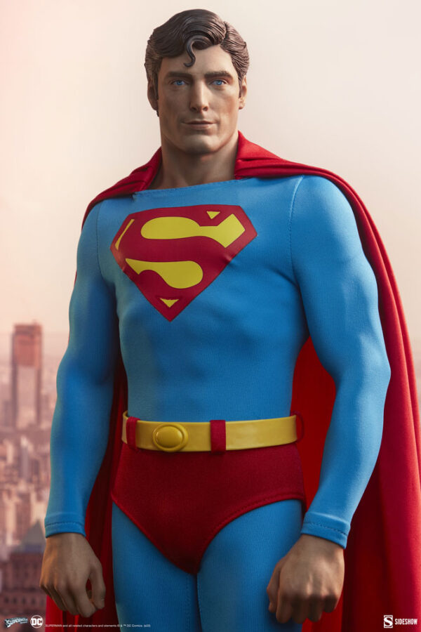 Superman: The Movie Premium Format™ Figure from Sideshow Collectibles and DC Comics. High-quality collectible figure of Superman standing confidently with his hands at his sides, featuring his classic blue costume with red cape and the iconic "S" emblem on his chest.