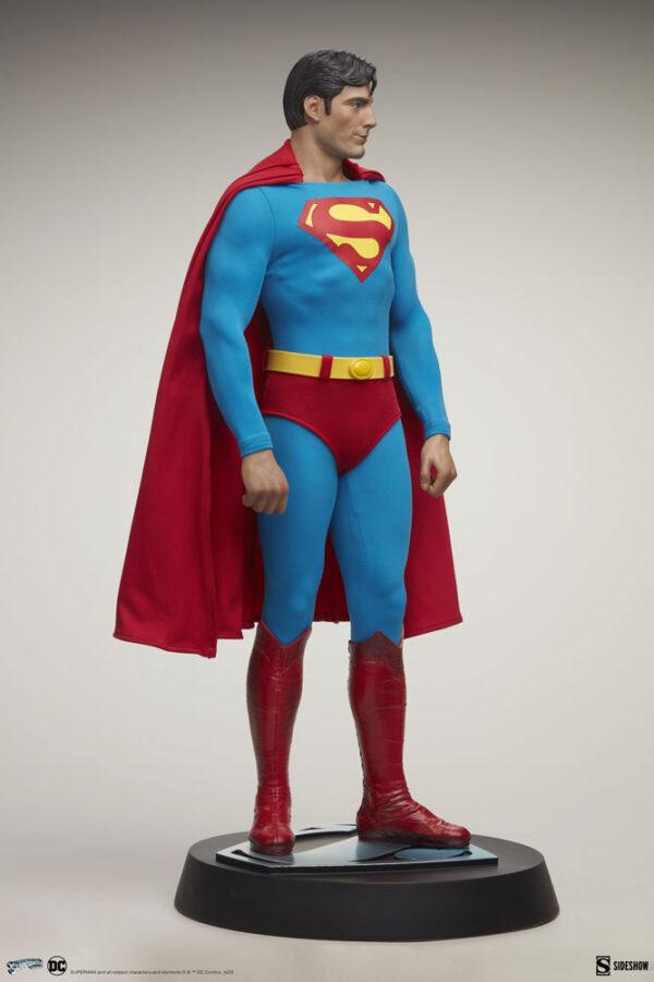 Superman: The Movie Premium Format™ Figure from Sideshow Collectibles and DC Comics. A collectible figure of Superman with traditional costume and cape on a display stand.