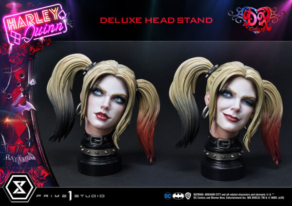 Harley Quinn Deluxe Batman Arkham City Statue Deluxe Version 1:3 Scale Statue from DC Comics and Prime 1 Studio. A detailed collectible head stand featuring two interchangeable heads of the character Harley Quinn with blonde hair and half black half red tips, inspired by Batman: Arkham City, with a neon sign logo in the background.