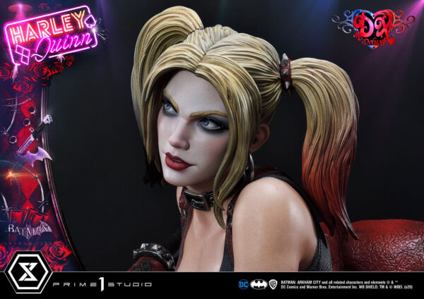 Harley Quinn Deluxe Batman Arkham City Statue Deluxe Version 1:3 Scale Statue from DC Comics and Prime 1 Studio. Detailed image of a collectible figurine based on a comic book character, featuring a close-up of the character with stylized hair and makeup, against a dark background with neon sign and logo graphics.