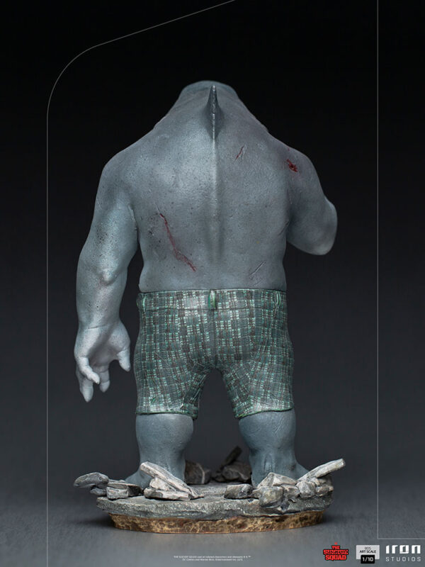 King Shark 1:10 Scale Statue from Iron Studios and DC Comics. A collectible figure of a muscular, shirtless character wearing checkered boxer shorts, standing on a base of rubble.