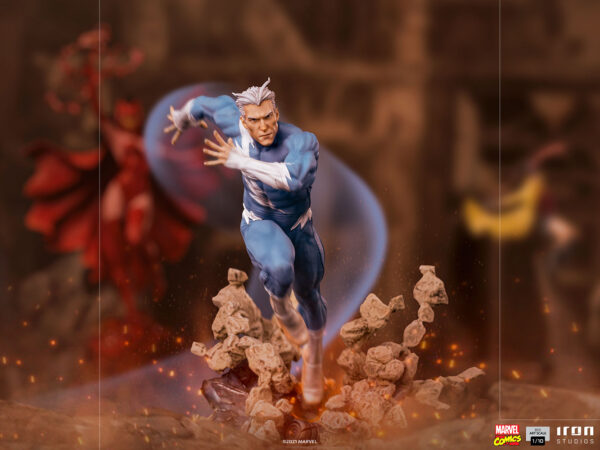 Marvel Quicksilver 1:10 scale statue from Iron Studios. A figurine of a superhero in a dynamic running pose with a protective energy field around him, against a blurred background with another figure.