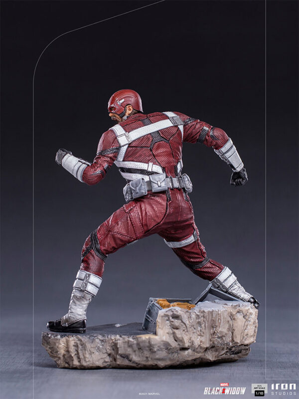 Marvel Red Guardian 1:10 Scale Statue from Iron Studios. A detailed collectible figure of the Red Guardian character in a dynamic action pose on a rock-like base.