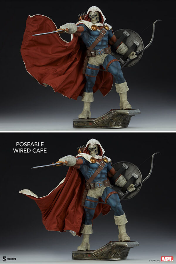 Marvel Taskmaster Premium Format Figure from Sideshow Collectibles. An action figure of a skeletal warrior in blue and red attire with a cape, wielding a spear and shield, standing on an ornate base.