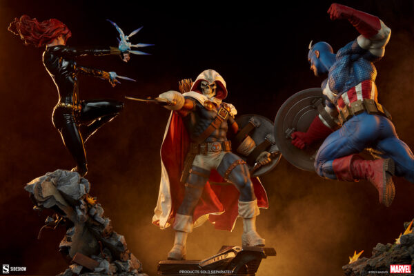 Marvel Taskmaster Premium Format Figure from Sideshow Collectibles. Three dynamic collectible figures in action poses: Black Widow, Taskmaster and Captain America. A character with a skull mask and cape aiming a bow, a female character with black suit and energy powers, and a male character with a shield mid-leap against a fiery background.