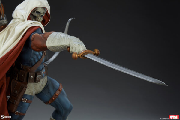 Marvel Taskmaster Premium Format Figure from Sideshow Collectibles. A highly detailed collectible figure of Taskmaster holding a sword with a focus on the textured gauntlet and blade.