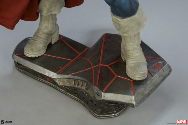 Marvel Taskmaster Premium Format Figure from Sideshow Collectibles. Close-up of a collectible superhero figure standing on a metallic display base with red detailing.