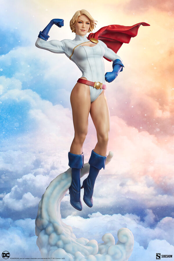 Power Girl Premium Format™ Figure from Sideshow Collectibles. A high-quality statue of the superhero Power Girl, wearing her iconic costume with a cape, posed heroically above the clouds.