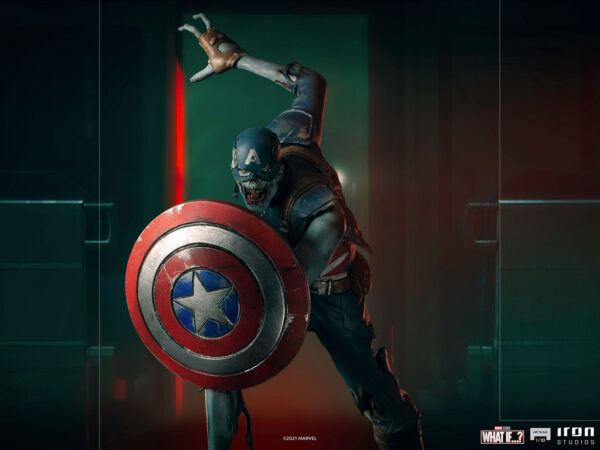 Zombie Captain America Art Scale 1:10 Statue. Zombie Captain America statue in a crouched pose, holding his iconic shield in a defensive stance. His skin appears decayed and blue-toned, with exposed muscles and torn uniform, embodying a grotesque and undead version of the classic Marvel superhero. The statue is set on a rugged, metallic base.