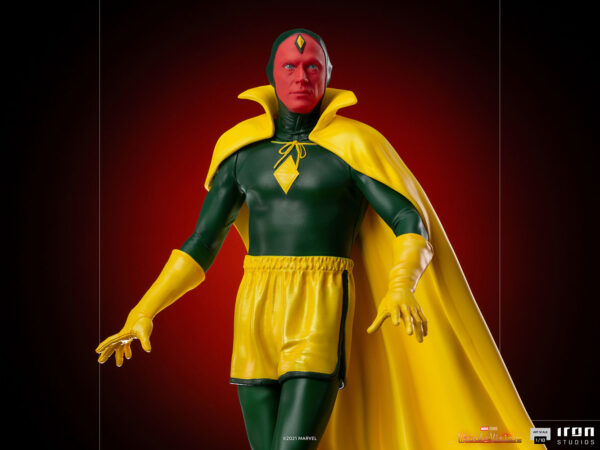 Vision Halloween Version WandaVision Art Scale 1:10 Statue from Marvel and Iron Studios. A detailed collectible figure of the superhero Vision in classic costume with a red face, green suit, yellow cape, and the iconic yellow and red detailing.