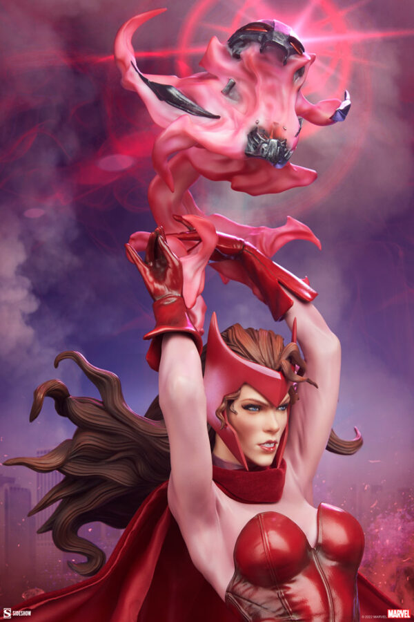 Marvel Scarlet Witch Premium Format™ Figure from Sideshow Collectibles, 2021. An illustrated portrait of Scarlet Witch with a red costume and headdress, using her chaos magic powers with a mystical creature floating above her hands against a smoky purple backdrop.