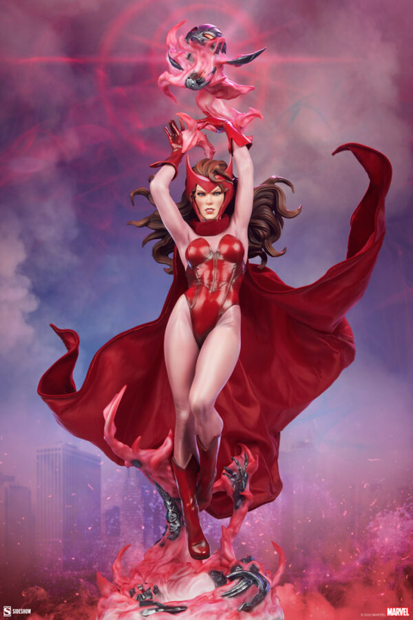 Marvel Scarlet Witch Premium Format™ Figure from Sideshow Collectibles, 2021. Illustration of a superheroine in a red costume with telekinetic powers, levitating with an ethereal creature above her hand, amidst a mystical red-hued background.