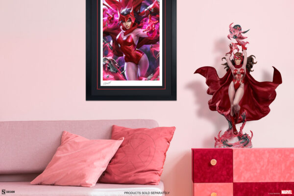 Marvel Scarlet Witch Premium Format™ Figure from Sideshow Collectibles, 2021. A living room corner featuring a framed illustration and a statue of Scarlet Witch on pink furniture with X-Men pillows.